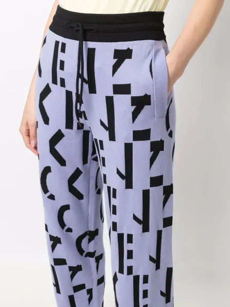 all-over logo-print trousers